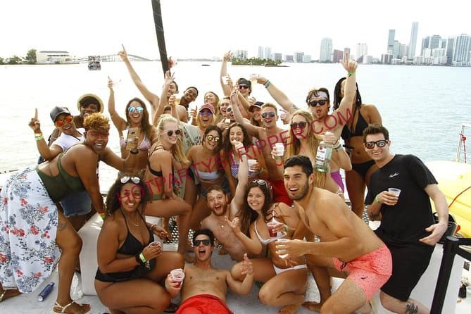 people in miami partying on a yacht